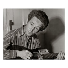 Cargar imagen en el visor de la galería, Digitally Restored and Enhanced 1943 Woody Guthrie Photo Print - Vintage Portrait Photo of Woody Guthrie Playing Guitar - Woody Guthrie Old Poster Photo
