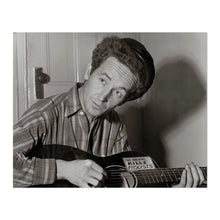 Cargar imagen en el visor de la galería, Digitally Restored and Enhanced 1943 Woody Guthrie Photo Print - Vintage Portrait Photo of Woody Guthrie Playing Guitar - Woody Guthrie Old Poster Photo
